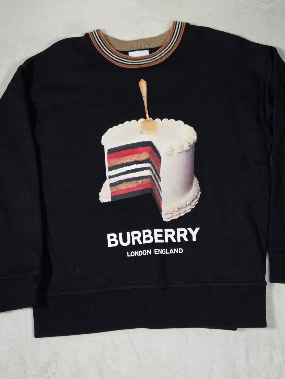 Burberry Black Crewneck Sweater with Cake Graphic and Striped Collar